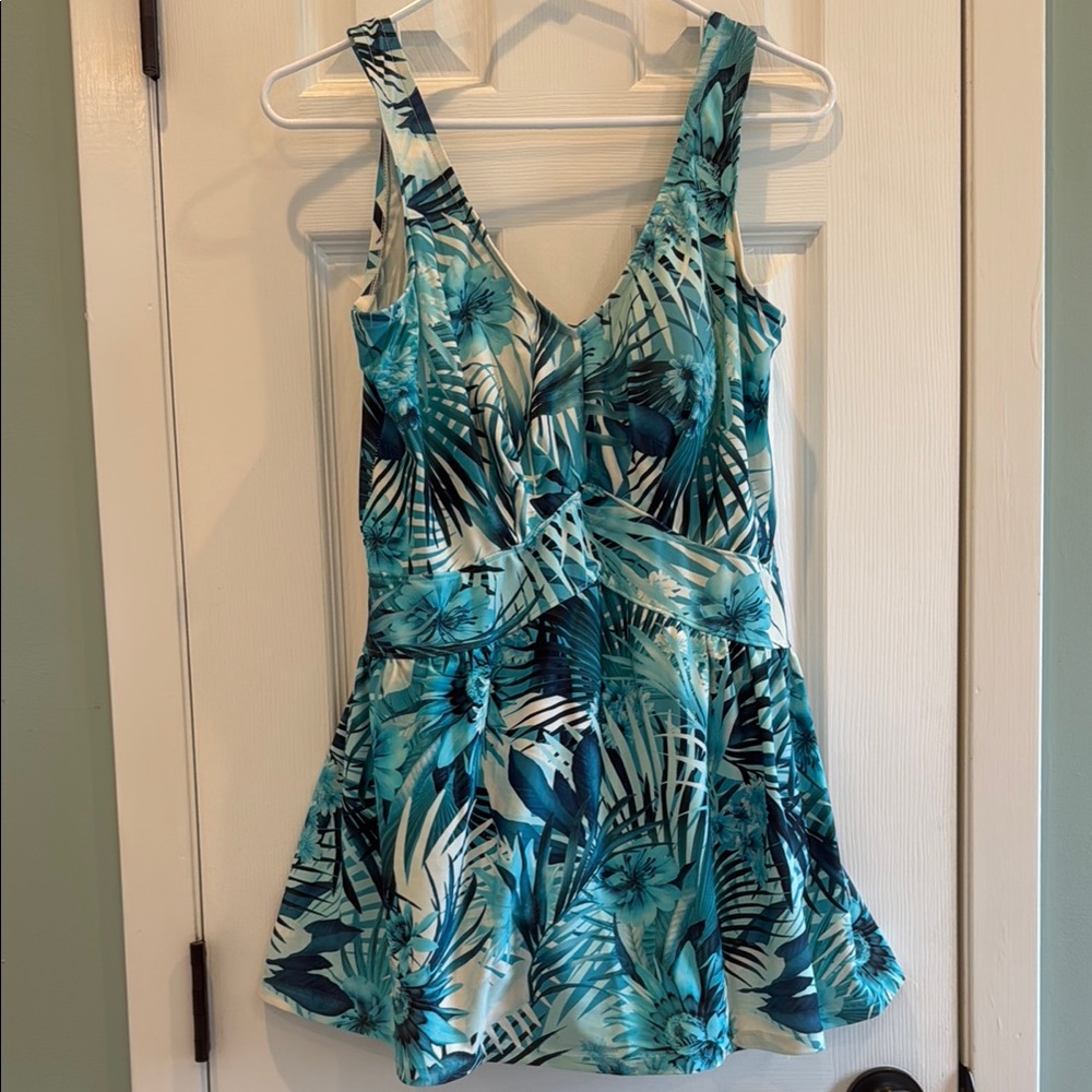 Very comfortable one piece skirted bathing suit in a blue palm floral print